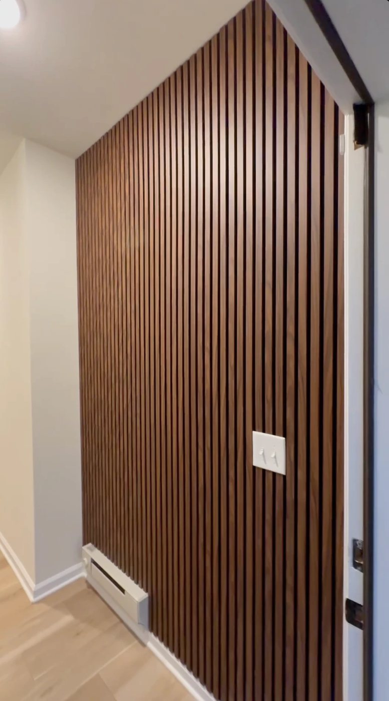 Customer install photo - walnut slat hallway